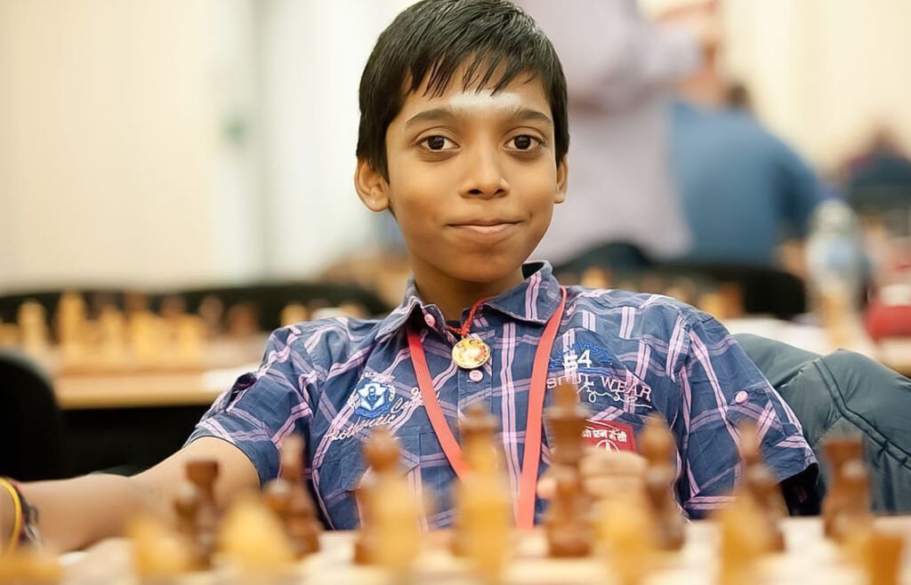 Rameshbabu Praggnanandhaa with Viswanathan Anand. Rameshbabu Praggnanandhaa  (born 10 August 2005) is an Indian chess player. A chess prodigy, he is  the, By Bangladesh IQ Olympiad